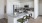 a kitchen with white cabinets