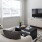 a living room with a tv and couches