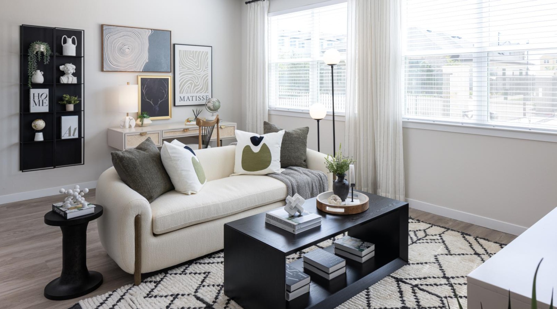 living room with ample natural lighting from large windows